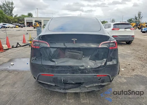 2024 Tesla Model Y from USA, damaged, VIN 7SAYGDED0RF103065